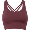 A maroon cropped tank top featuring a stylish crisscross strap design and a smooth finish. Includes branding.