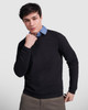 A black sweatshirt worn by a young man, featuring a layered look with a blue collared shirt underneath.
