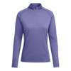 A purple polar fleece sweatshirt with a high collar and long sleeves, featuring a quarter zip and a logo.