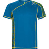 A blue T-shirt with yellow accents and patterned side panels, featuring a logo on the neckline.