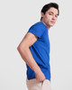 A blue Samoyedo T-shirt on a model, featuring a fitted style and a simple design.