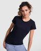 A navy blue t-shirt with short sleeves, worn by a model in a casual pose. The shirt features a logo.