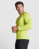 A fitted long-sleeved T-shirt in vibrant lime green, featuring a sleek design and a logo on the sleeve.