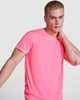 A bright pink t-shirt featuring a crew neckline, showcased on a model with a casual pose. The shirt has a logo.