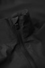 A black jacket featuring a high collar and zip closure, with a minimalist design. It has a logo on the fabric.