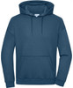 An oversized unisex hoody in a deep blue tone, featuring a front pocket and a hood. It has a logo on the label.