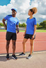 A men's running T-shirt in blue, displayed with matching black shorts, alongside a female model in similar attire.