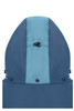 A hardshell rainjacket in navy blue and light blue, featuring an adjustable hood and snap closures.
