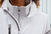 A softshell work vest in light grey, featuring a high collar and zippered pockets, with a logo displayed.