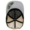 A grey and beige cap with a perforated design and an inner patterned lining, featuring a logo.