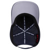 A navy and grey 6 panel mid-profile perforated baseball cap with an inner lining featuring a logo.