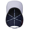 A navy and grey 6 panel mid profile baseball cap featuring an inner comfort fit band and a logo.