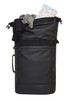 A black active backpack filled with clothing and a map, featuring a top opening and side pocket.