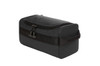 A black toiletry bag with a zippered top, featuring a sturdy handle and side straps.