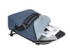 A blue notebook bag with a partially open flap, revealing a laptop, documents, and a mouse inside.