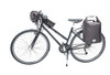 A black bicycle with a handlebar bag and two side bags, all in dark fabric. The bike has a sleek design.