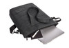 A dark grey laptop bag features a strap, partially unzipped, revealing a laptop and a notebook inside. It has a logo.