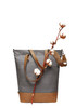 A grey and tan tote bag with a plant branch featuring cotton bolls, and an attached shoulder strap.