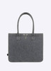A grey tote bag with two handles and a decorative logo, made from felt material.