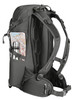 A charcoal grey outdoor backpack with a water bottle and map visible in side pockets. Features multiple straps and compartments.