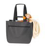 A grey tote bag with long handles, featuring a toy monkey and a blanket peeking out from inside.