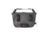 A grey felt lunch bag with black straps and a carrying handle, featuring a zip closure and branding.