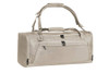 A beige duffle bag with multiple zippered pockets and an adjustable shoulder strap, featuring a logo.