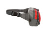 A grey and red waist bag with a zippered compartment and an adjustable strap. It features a logo on its surface.