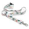 A colourful lanyard featuring various patterns and a clip for attachment, displaying a logo.