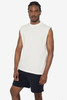 A sleeveless white tee with a minimalist design, paired with black shorts, displayed on a model.