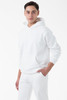 A white heavy fleece hood pullover worn by a model, set against a plain white background. It features a logo.