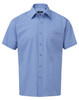 A light blue short-sleeved button-up shirt featuring a chest pocket and a collar, with a logo on the label.