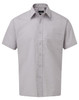 A short-sleeved button-up shirt in a light grey colour with a single pocket and a logo.