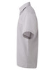 A light grey short-sleeve button-up shirt with a collar. It features a logo on the front.
