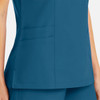 A teal mock wrap top featuring pockets, designed for women's wear with a sleek and modern fit.