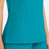 A teal women's mock wrap top featuring pockets and a fitted design, with a smooth fabric texture.