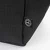 A black cooler bag featuring a logo, made from recycled materials. The textured fabric is visible in the image.