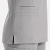 A grey double V-neck top featuring side slits and a patch pocket on the back. The garment has a subtle, sleek design.