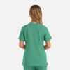 A green women's double v-neck top with short sleeves, featuring a logo on the back.