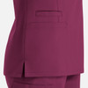 A burgundy women's double V-neck top featuring side slits and a pocket. The image highlights the fabric and cut.