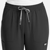 A pair of women's full elastic pull-on pants in dark grey with a drawstring and pockets, featuring a logo.