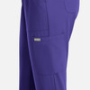 A pair of women's full elastic pull-on pants in purple, featuring side pockets and a logo.