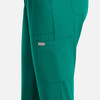 A pair of women's pull-on pants in a vibrant teal colour, featuring side pockets and a branding logo.