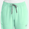 A pair of women's full elastic pull-on pants in mint green with pockets and a drawstring.
