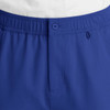 A pair of blue cargo pants featuring a fly front, button closure, and an elastic waistband. It has a logo.