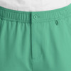 A pair of men's cargo pants in a vibrant green colour, featuring a fly front and elastic waistband.