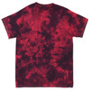 A red and black tie-dye t-shirt featuring a swirling pattern, with a branding logo on the garment.