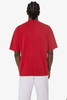A red short sleeve crewneck tee is displayed, featuring a simple design and a relaxed fit.