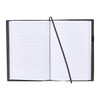 A refillable journal with a black leather cover, featuring lined pages and a ribbon bookmark.