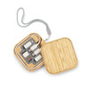 A wooden square charger set in a bamboo case, featuring multiple connectors and a grey strap.